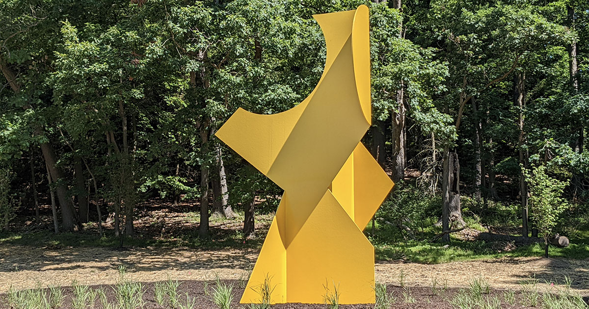 large yellow metal sculpture