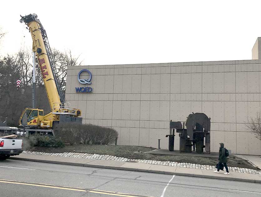sculpture being moved