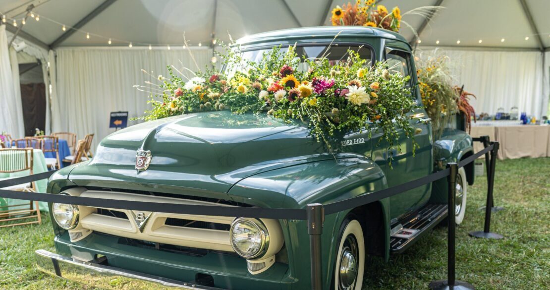 Vintage truck decorated in wild flowers