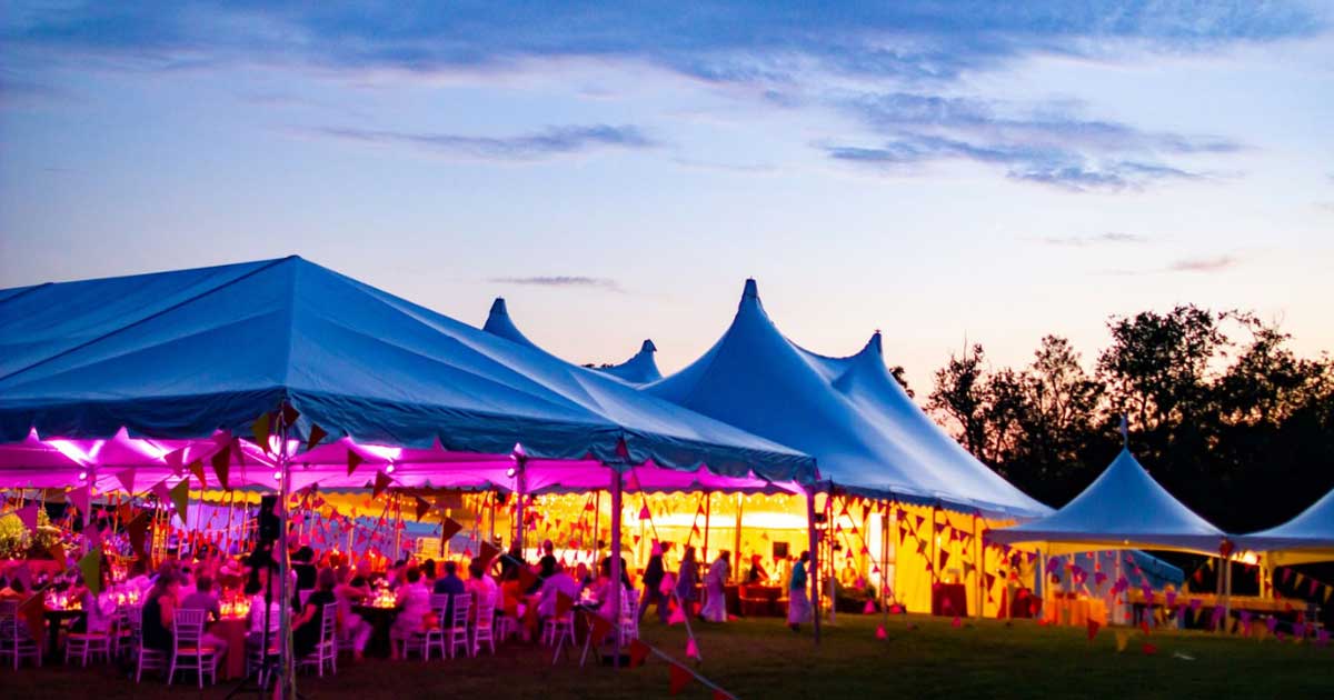 large tents with purple lighting
